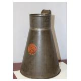 A Vintage Tin Pitcher