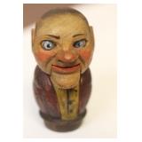 A Carved Wooden Stopper