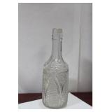 A Pressed Glass Wine Bottle