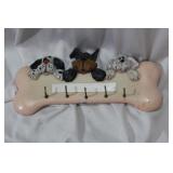 A Dog and Bone Wall Hanger