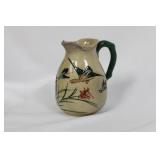 A Japanese Pottery Pitcher