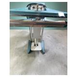 industrial foot-operated impulse bag sealer. 