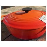 Le Creuset Enameled Cast Iron Dutch Oven In Flame Orange Color