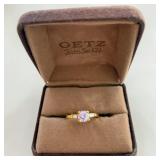 Yellow Gold Three-Stone Ring W Light Purple Central Gemstone & Small Side Stones