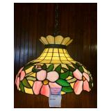 Tiffany-style stained glass hanging pendant lamp featuring a pink and yellow floral motif.
