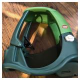 Little Tikes Cozy Coupe Dinosaur ride-on car in a vibrant green color Little Tikes Cozy Coupe Dinosaur ride-on car in a vibrant green color