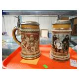 2 DECORATED STEINS