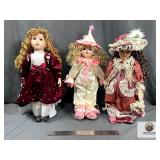 LOT OF THREE VINTAGE PORCELAIN OR CERAMIC DOLLS