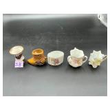 Five porcelain and china-style toothpick holders