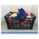 Crate of Crocheted Items and Yarn