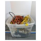 Tote full of extension cords and other items
