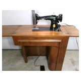 Singer Sewing Machine in Wooden Cabinet
