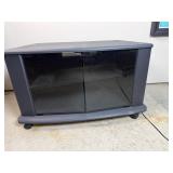 Black Corner TV Stand w/ Glass Doors & Casters