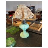 Uranium glass oil lamp with doily lamp shade
