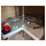 Contents of Cabinet - strainers and misc