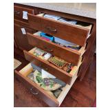 Contents of 4 Drawers - linens, kitchen supplies, misc