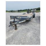 2009 Trailer 24'ft. x 88' inches. 2'ft dove tail. Has ramps.