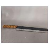 Knife with 9” serrated blade
