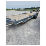 2009 Trailer 24'ft. x 88' inches. 2'ft dove tail. Has ramps.