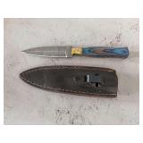 Knife w/ 4”blade & sheath has some rust on  handle