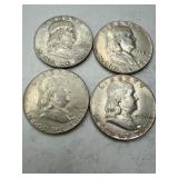 Four Franklin Half Dollars