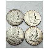 Four Franklin Half Dollars