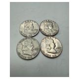 Four Franklin Half Dollars