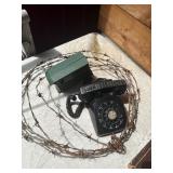 Vintage Rotary Phone, Green Cart, and Barbed Wire