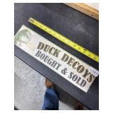 Wooden Sign Reading 'Duck Decoys Bought & Sold'