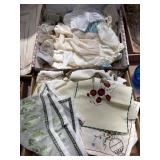 Two Boxes of Doll Clothing and Linens