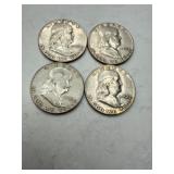 Four Franklin Half Dollars