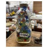 Glass Jar with Lid Filled with Marbles