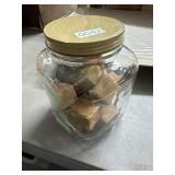 Glass Jar Containing Wooden Blocks
