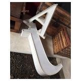 Large White Metal Channel Letters A and J