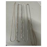 Four Silver Tone Necklaces