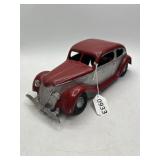 Red and Silver Pressed Steel Toy Car