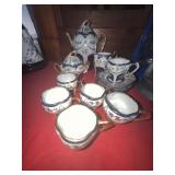 Hand-Painted Porcelain Tea Set With Gilt Trim