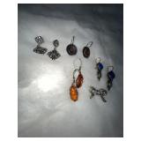 Five Pairs of Silver Earrings and Bow Pin