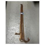 Four Wooden Walking Sticks and Cane