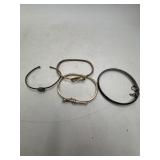 Four Metal Bangle Bracelets