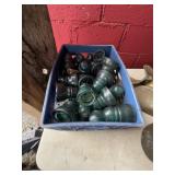 Crate of Green Glass Electrical Insulators