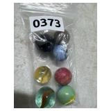 Glass and Clay Marbles, 7 Pieces