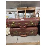 Brown Leather Suitcases with Brass Hardware