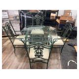 GLASS TOP TABLE WITH METAL BASE AND FOUR CHAIRS