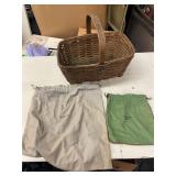 WICKER BASKET AND TWO VINTAGE MONEY BAGS