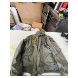 VINTAGE COAT WITH ASSORTED MILITARY PATCHES