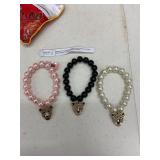 (3)- STRETCHABLE CHARM BRACELETS