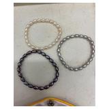 (3)- STRETCHABLE FRESHWATER PEARL BRACELETS