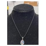 PENDANT ON BLACK CORD NECKLACE