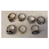 (7)- ASSORTED SIZED RINGS